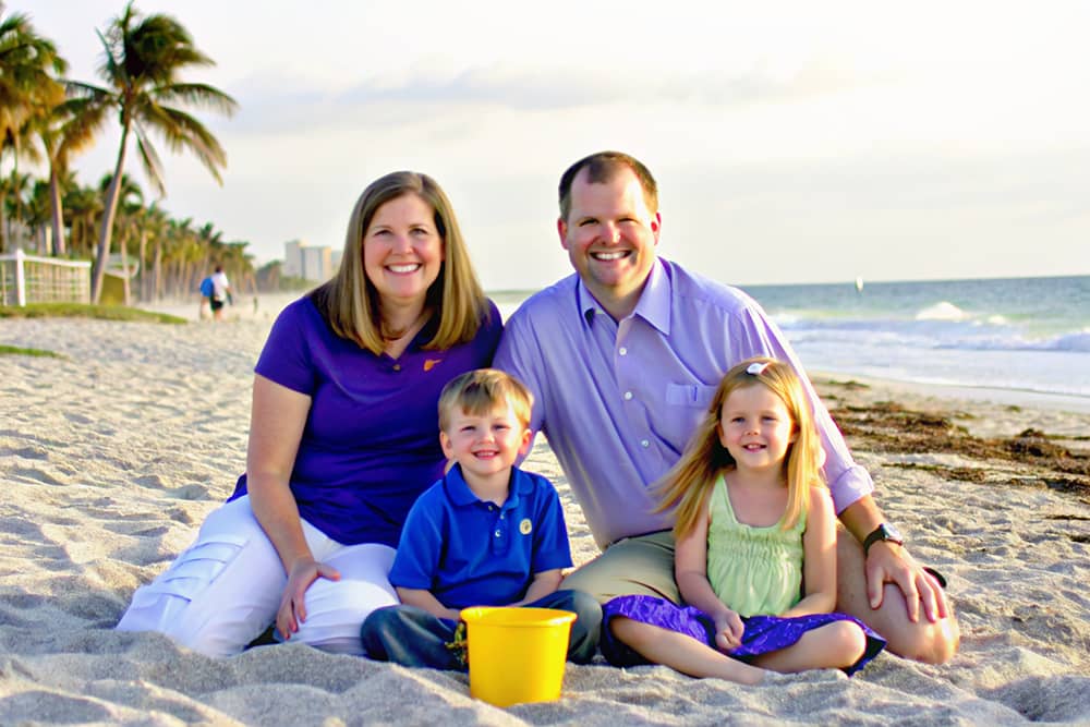 A family of four enjoying summer